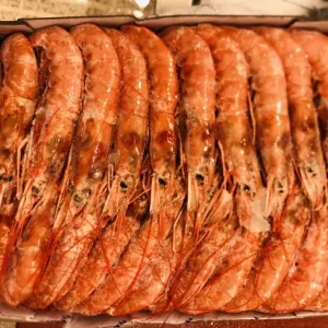 Caja de 2kg de gambón austral crudo congelado.